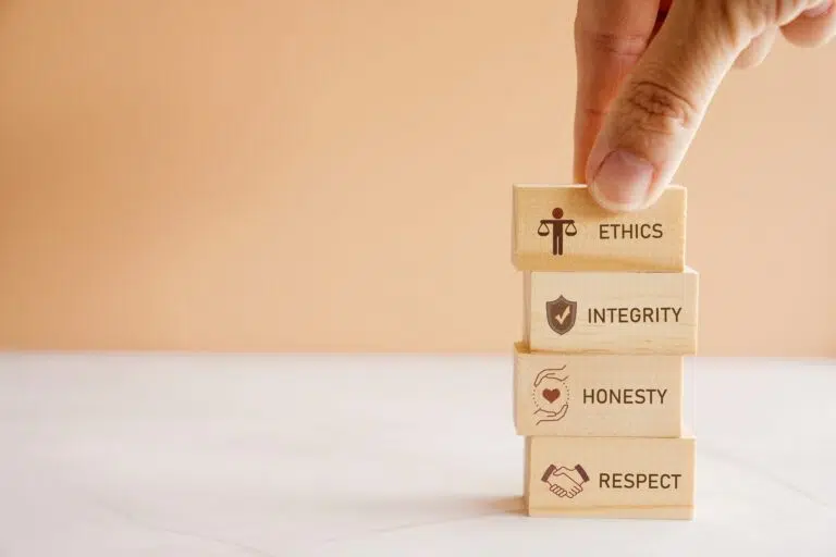 hand,holding,wooden,block,with,code,of,conduct,concept,,ethics,